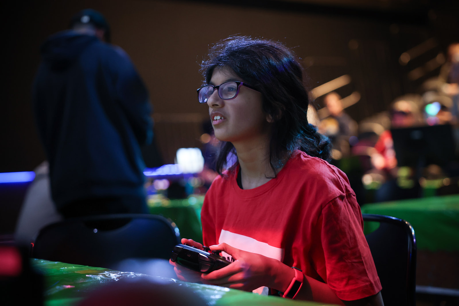 A young youth plays video games as part of a YMCA esports tournament