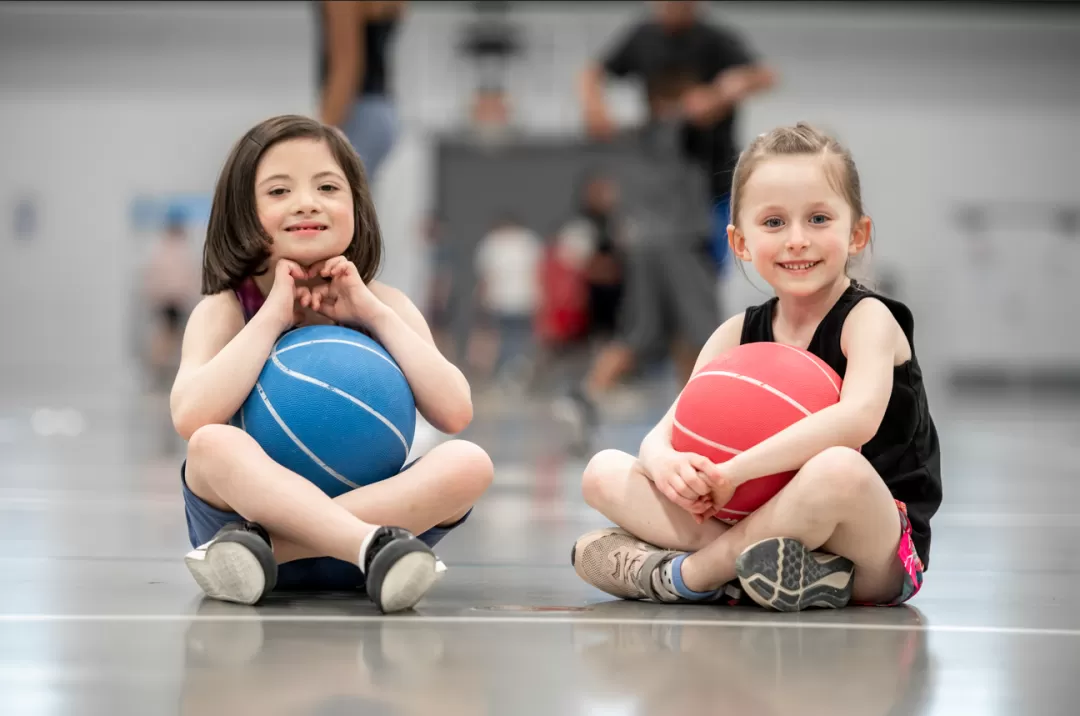 Young girls playing in gymnasium