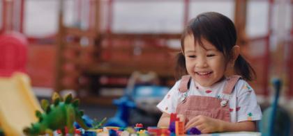 child playing with toys