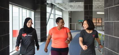 Group of women walking on track