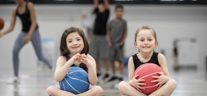 young girls playing in gymnasium