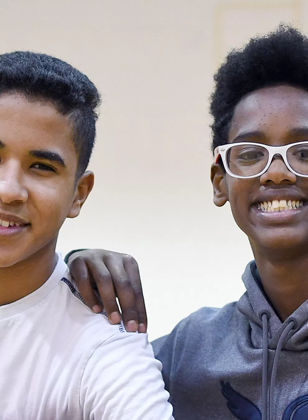 youth boys smiling in gymnasium