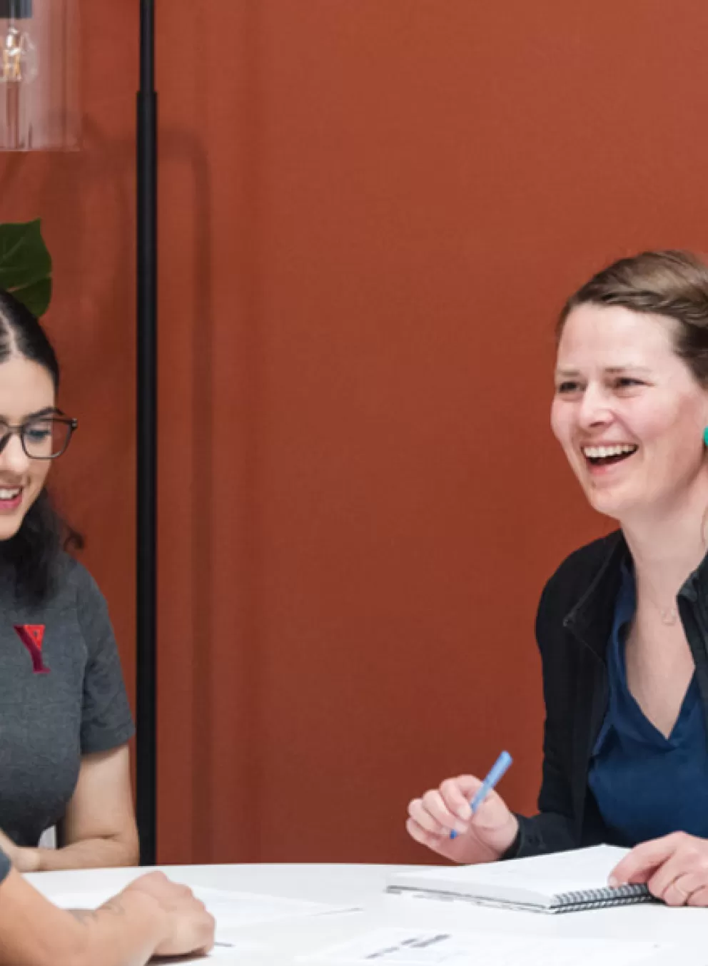 YMCA staff meeting around a table