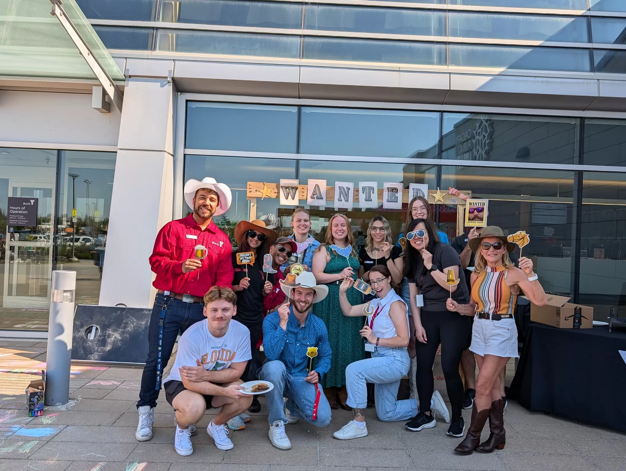 A group of YMCA staff pose at a Stampede Breakfast