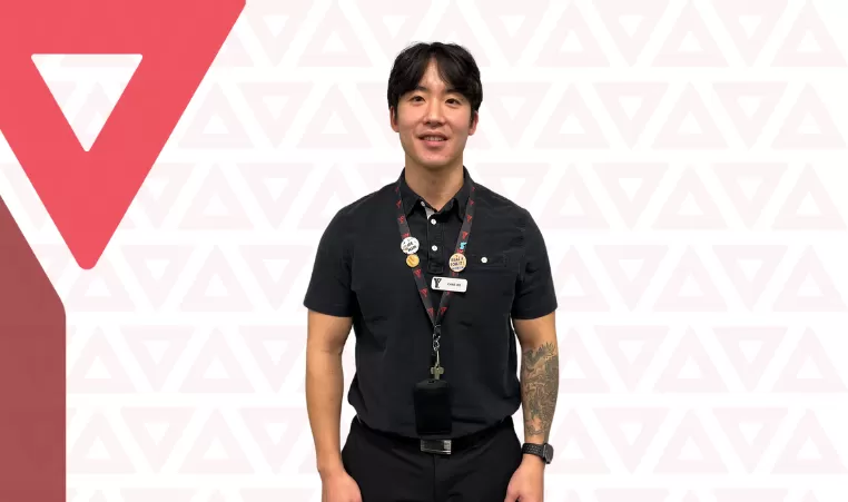 Chris Lee poses for a photo