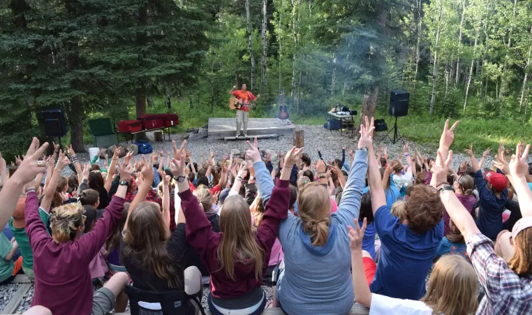 Youth enjoying at a campfire at Camp Chief Hector