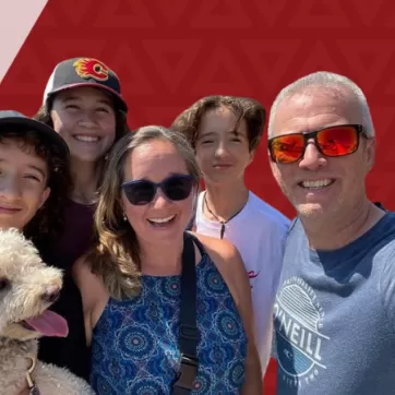 Terry Barron smiles with his family