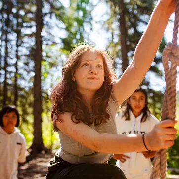 Young girl on swing