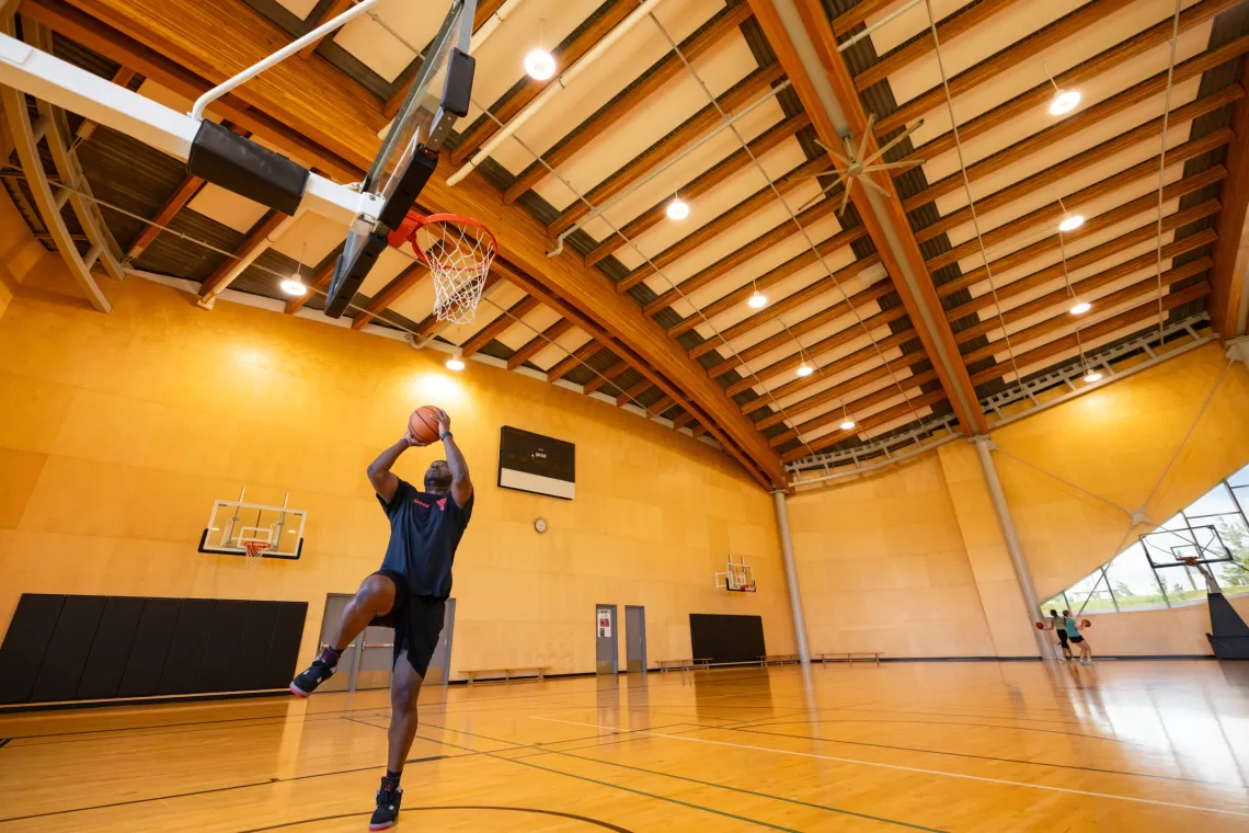 Basketball coach in the court