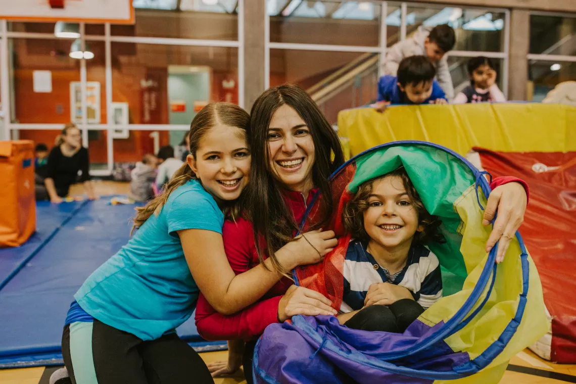 Mom playing with her daughter and son 