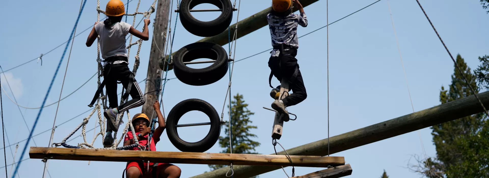Children in climbing obstacle course