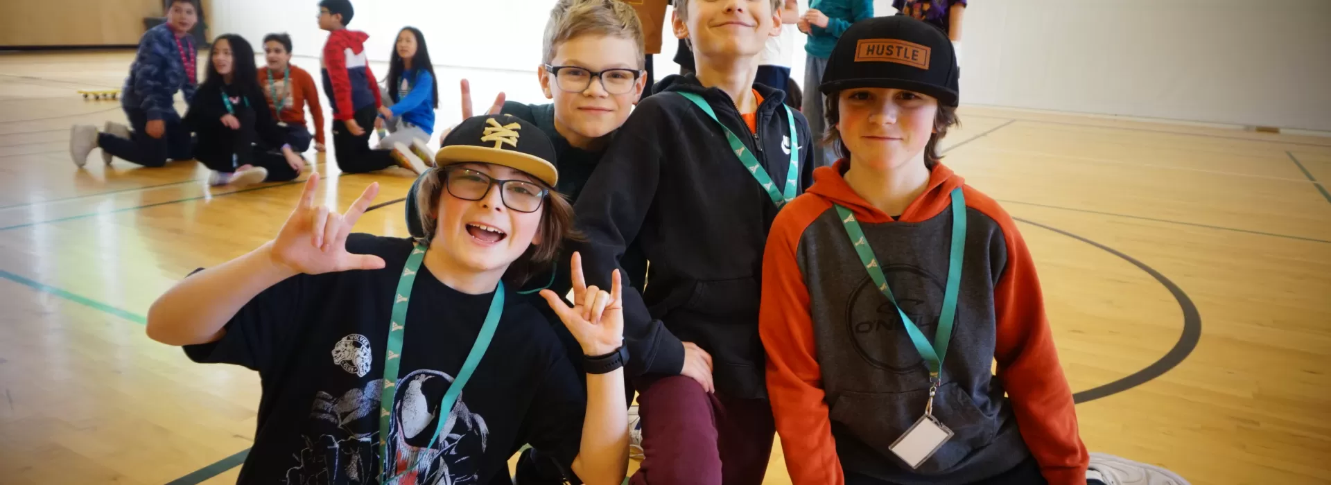 Classmates pose in the gym